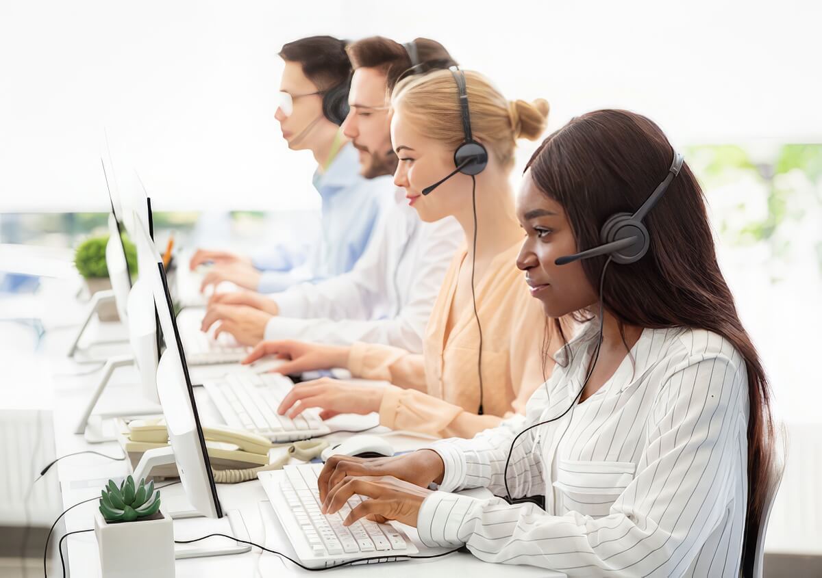 Focused call centre operators at open space office
